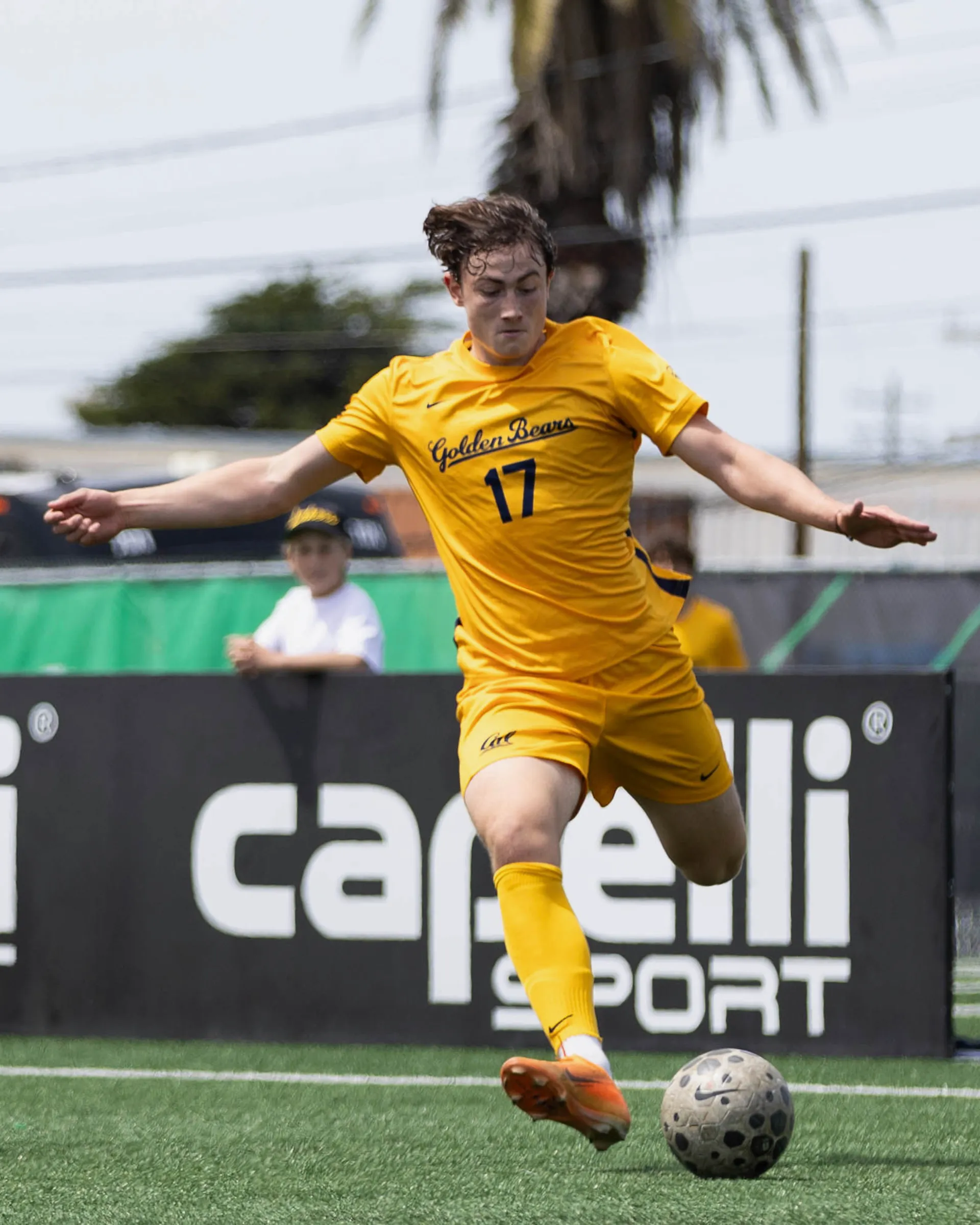 Miko in the Cal kit, on the ball